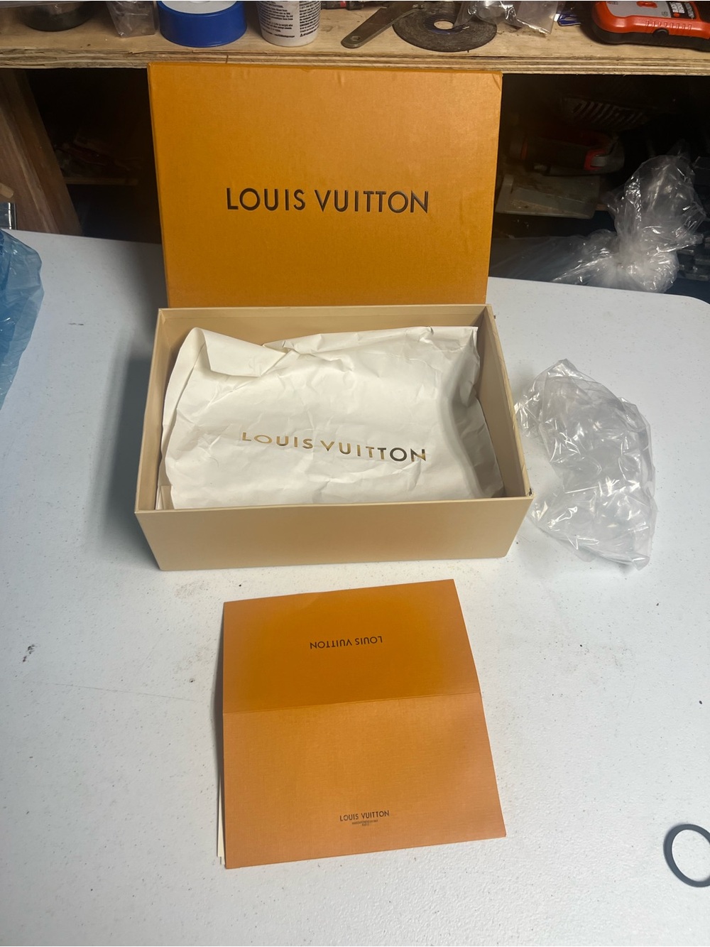 Storage box with branded dust bag and folder